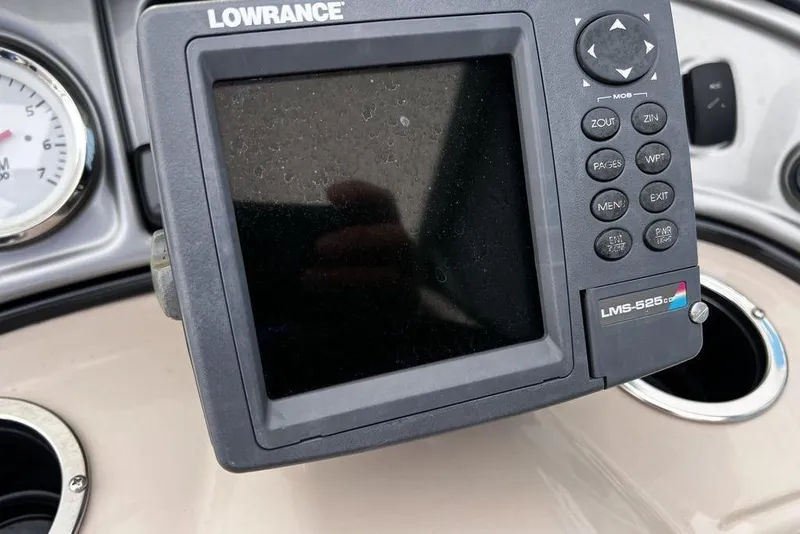 Slide: The Image of Lowrance LMS-525C fishfinder on 2026 Sun Tracker Party Barge 20 DLX dashboard. - 12