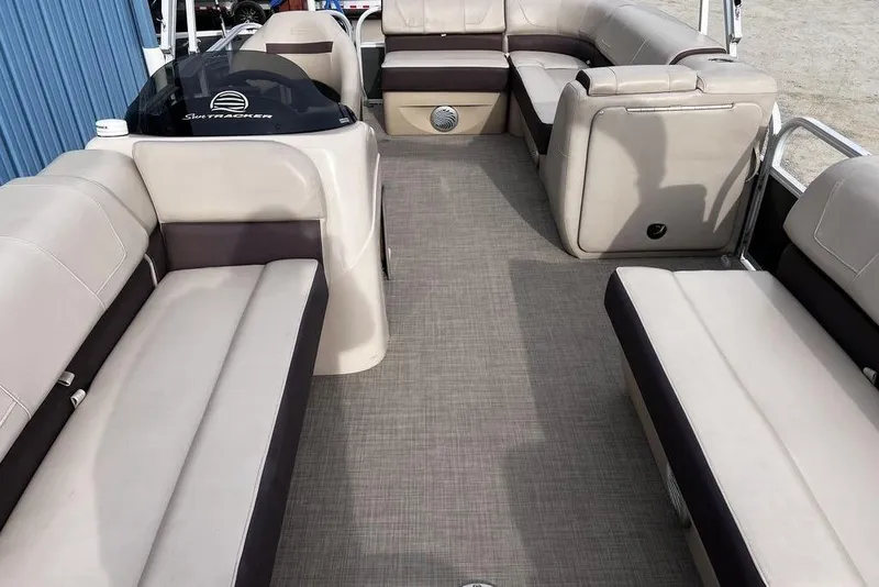 Slide: The Image of 2026 Sun Tracker Party Barge 20 DLX interior with spacious seating and modern design. - 20