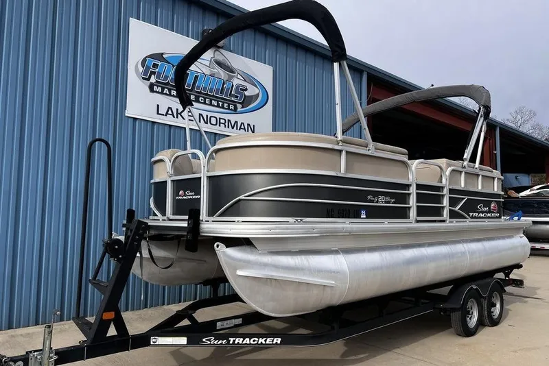 Slide: The Image of 2026 Sun Tracker Party Barge 20 DLX pontoon boat on trailer at Foothills Marine Center. - 4