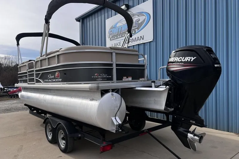 Slide: The Image of 2026 Sun Tracker Party Barge 20 DLX pontoon boat with Mercury outboard motor. - 5