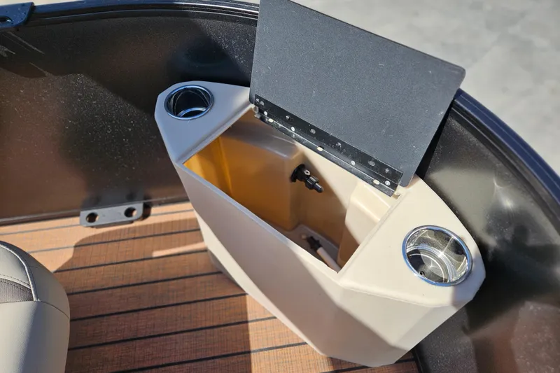 Slide: The Image of 2026 Bentley Pontoons Fish 243 Center Walk Through storage compartment with cup holders. - 10