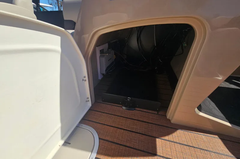 Slide: The Image of 2026 Bentley Pontoons Fish 243 Center Walk Through interior storage compartment. - 20