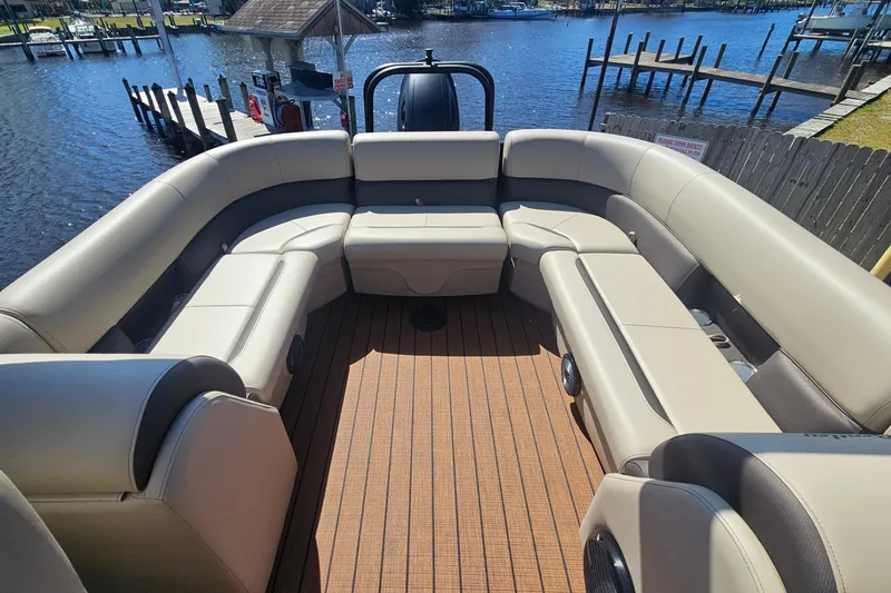 Slide: The Image of 2026 Bentley Pontoons Fish 243 Center Walk Through with spacious seating and elegant design. - 22