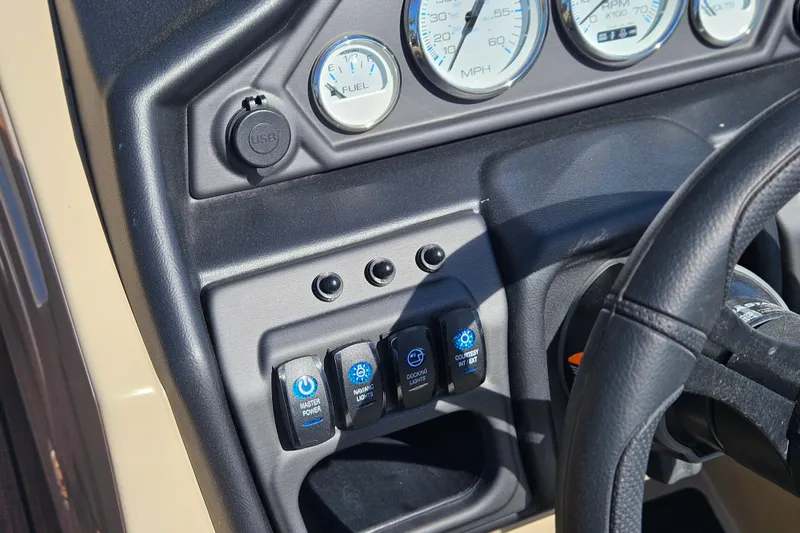 Slide: The Image of Dashboard of 2026 Bentley Pontoons Fish 243 Center Walk Through with gauges and controls. - 30