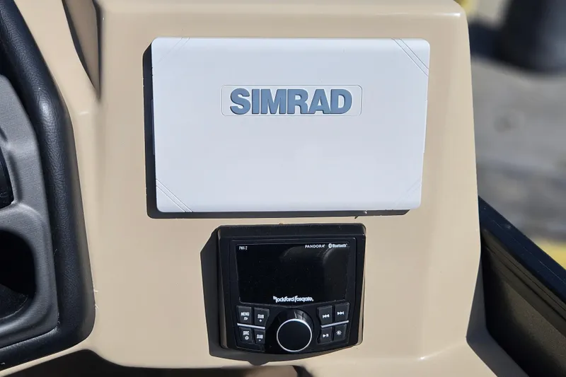 Slide: The Image of Simrad and Rockford Fosgate systems on 2026 Bentley Pontoons Fish 243 Center Walk Through. - 31