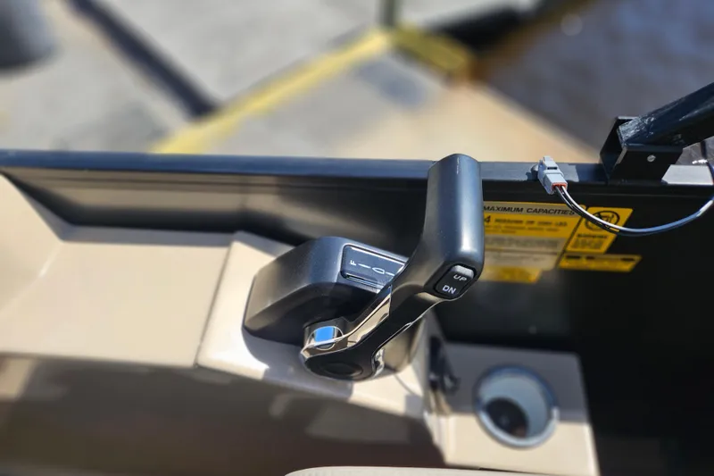 Slide: The Image of 2026 Bentley Pontoons Fish 243 Center Walk Through throttle control detail. - 32