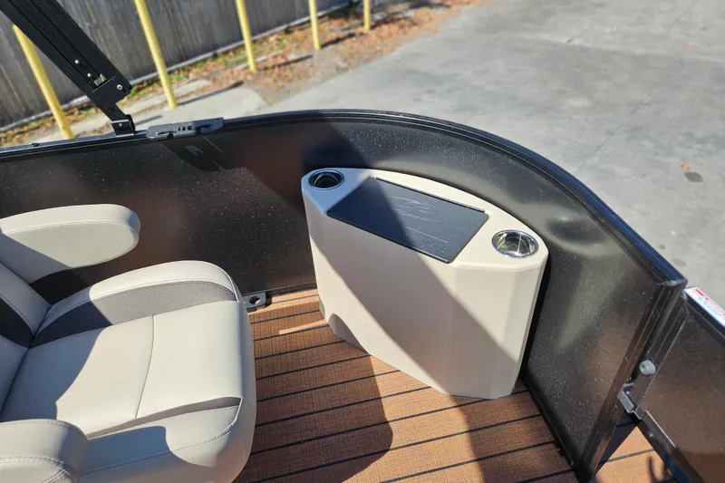Slide: The Image of 2026 Bentley Pontoons Fish 243 Center Walk Through interior with seating and cup holder. - 9