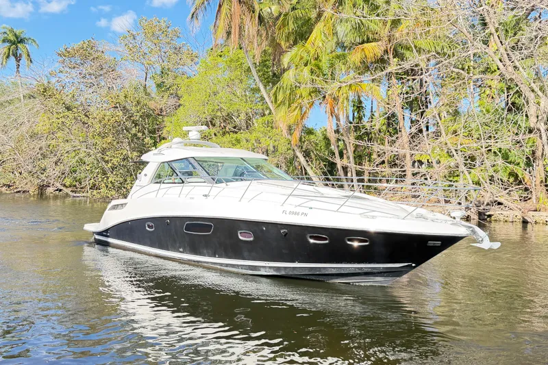 Slide: The Image of Luxurious bedroom interior of 2011 Sea Ray 450 Sundancer yacht with cozy bedding. - 39