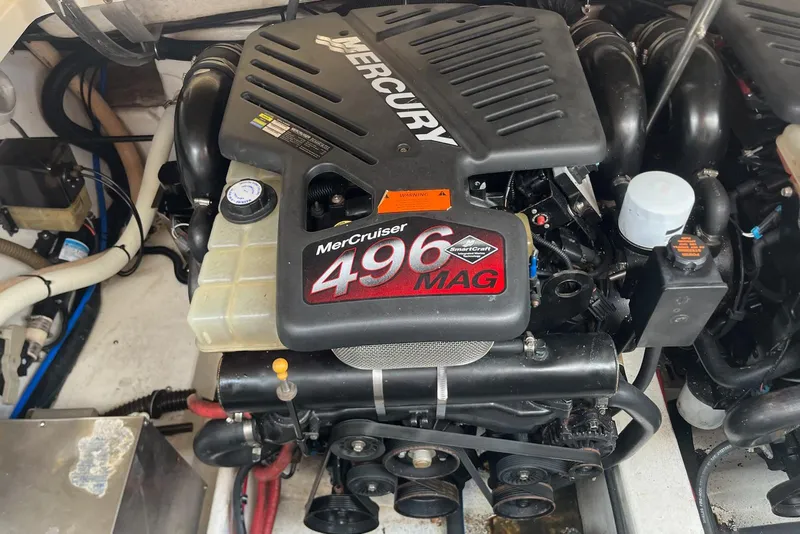 Slide: The Image of Engine of a 2002 Formula 330 Sun Sport boat, featuring a MerCruiser 496 MAG. - 38