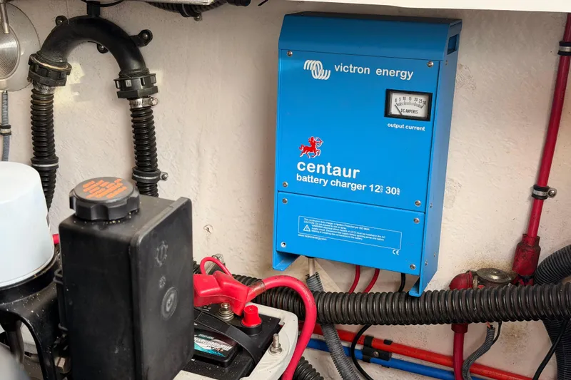 Slide: The Image of Victron Energy Centaur battery charger in 2002 Formula 330 Sun Sport boat engine compartment. - 39
