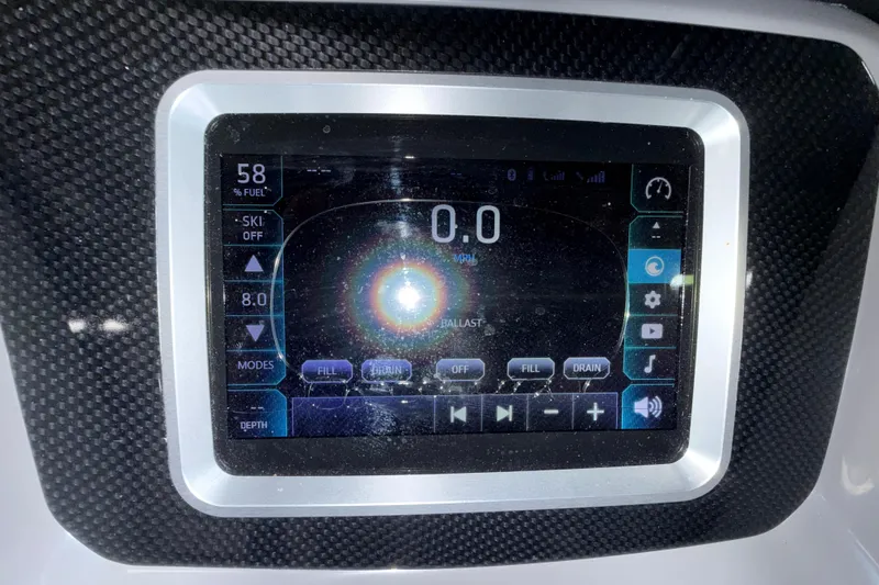 Slide: The Image of Touchscreen display of 2019 Chaparral Vortex 2430 VRX boat showing fuel and speed settings. - 18