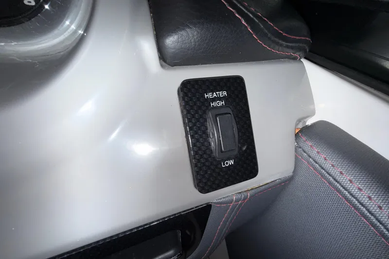 Slide: The Image of Heater control switch in 2019 Chaparral Vortex 2430 VRX boat interior. - 19