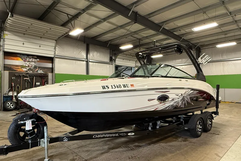 Slide: The Image of 2019 Chaparral Vortex 2430 VRX boat on trailer in indoor storage facility. - 4
