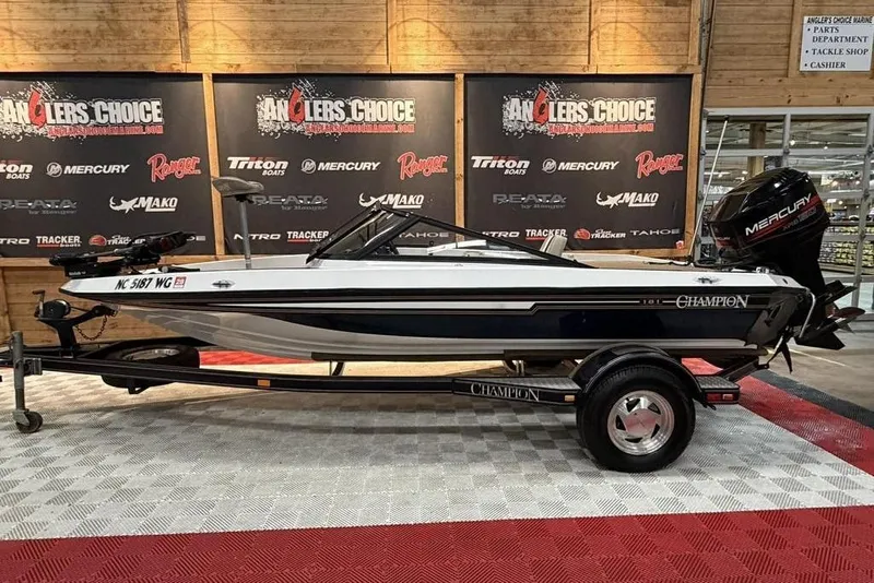 The Image of 1999 Champion 181 SX boat on display at Angler's Choice event. - 1