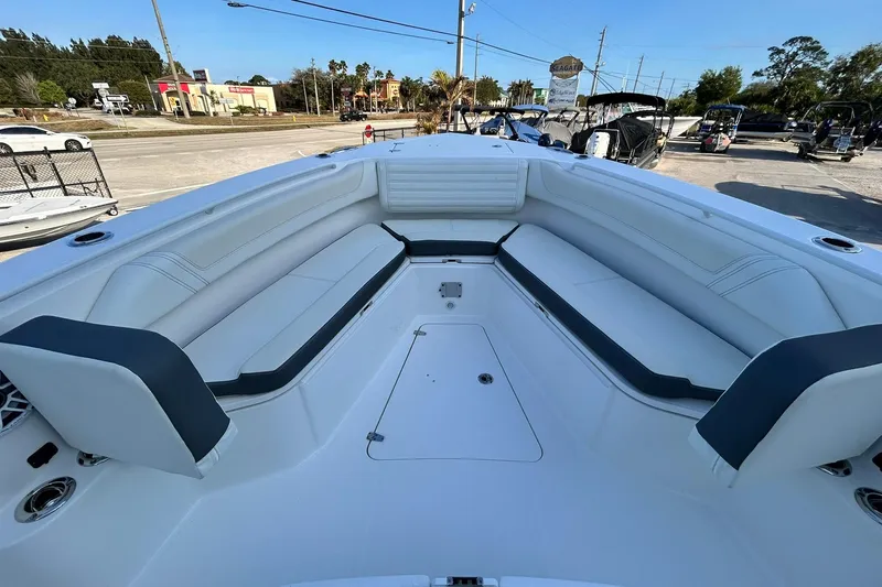 Slide: The Image of 2021 Edgewater 340CC boat interior with spacious seating and modern design. - 37