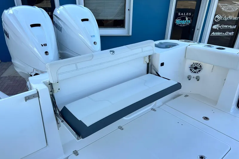 Slide: The Image of 2021 Edgewater 340CC boat with Yamaha V8 engines and foldable seating. - 4