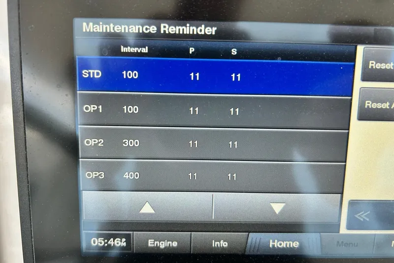Slide: The Image of 2021 Edgewater 340CC maintenance reminder screen displaying service intervals and options. - 48