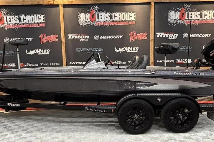 The Image of 2025 Triton 20XP Patriot boat on display at Anglers Choice event. - 1