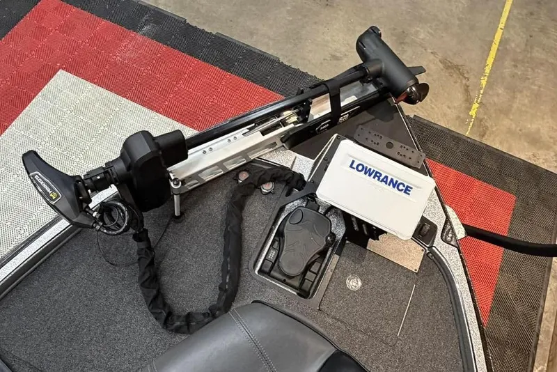 Slide: The Image of Triton 20XP Patriot 2025 boat deck with Lowrance equipment and trolling motor. - 7