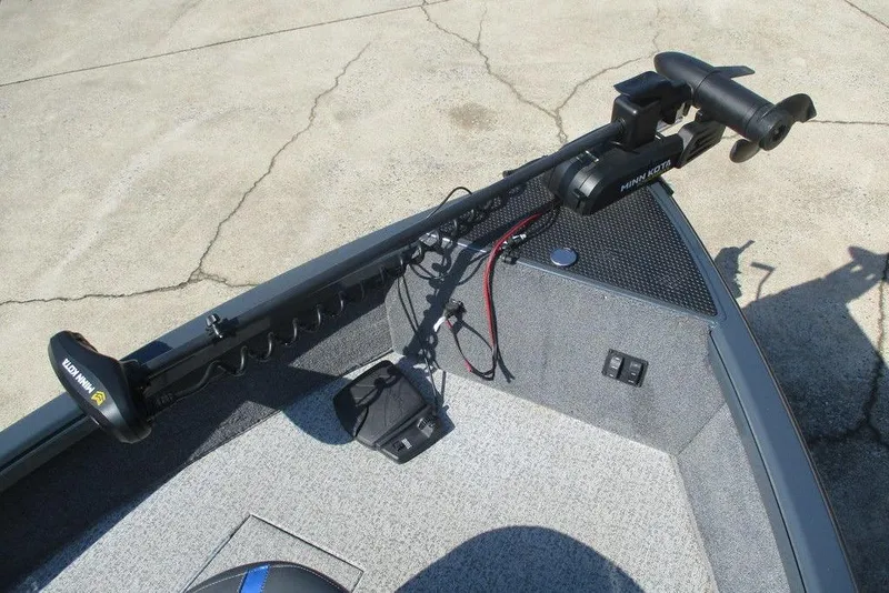 Slide: The Image of 2024 Ranger VS1665SC boat with Minn Kota trolling motor on deck. - 2