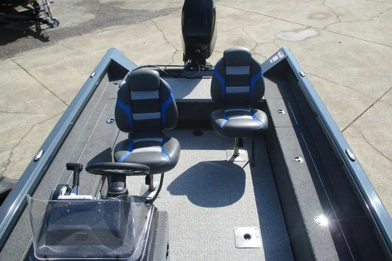 Slide: The Image of 2024 Ranger VS1665SC boat interior with two seats and steering console. - 5