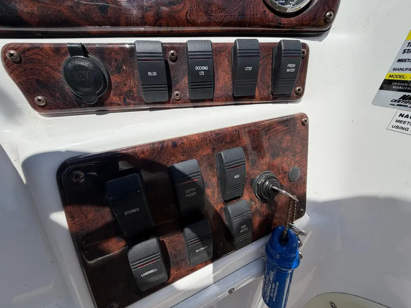 Slide: The Image of Dashboard of a 2014 Hurricane 202 Sundeck Sport boat. - 14