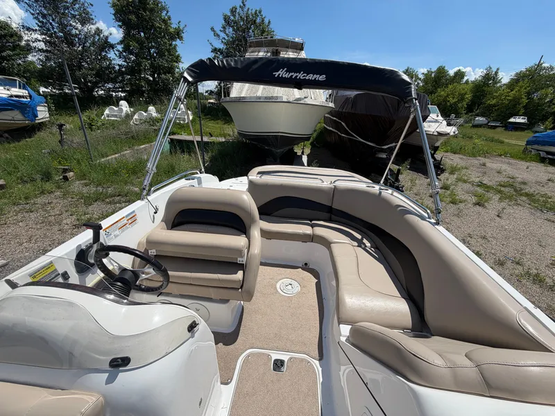 Slide: The Image of Interior of a 2014 Hurricane 202 Sundeck Sport boat on a lot. - 15