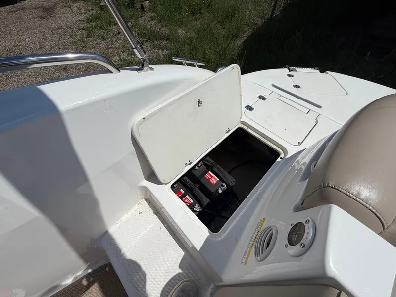 Slide: The Image of Battery compartment of a 2014 Hurricane 202 Sundeck Sport boat. - 23