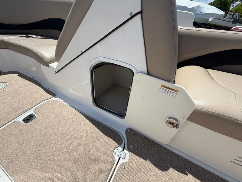 Slide: The Image of Storage compartment in Hurricane 202 Sundeck Sport boat, 2014 model. - 24