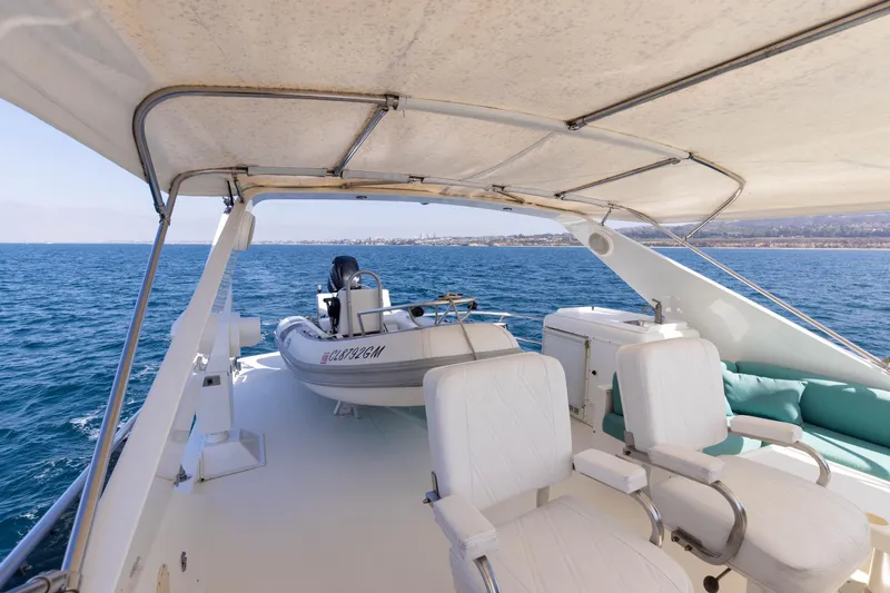 Slide: The Image of 1997 West Bay Sonship yacht deck with seating and ocean view. - 16