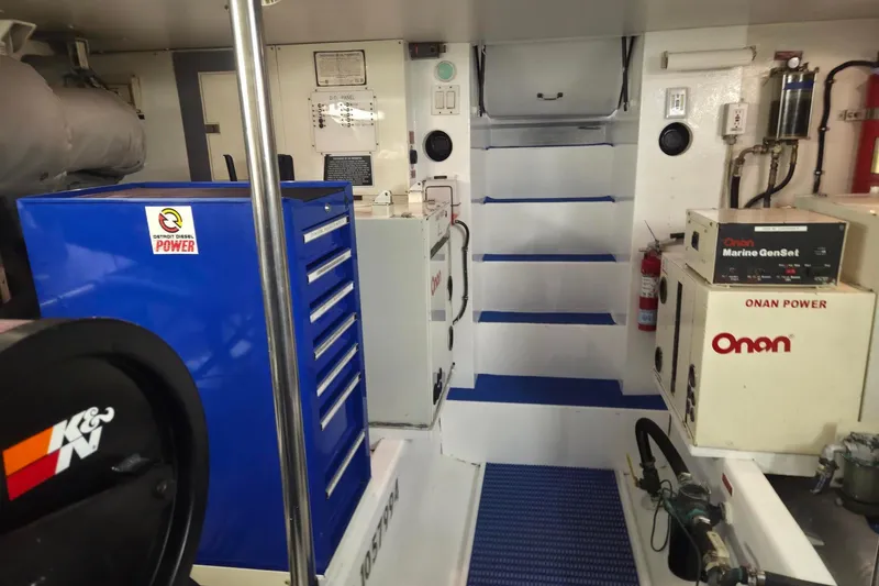 Slide: The Image of Engine room of 1997 West Bay Sonship yacht with Onan Marine GenSet and tool storage. - 20