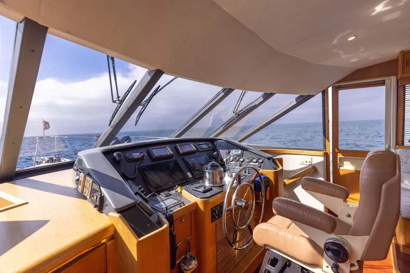 Slide: The Image of Interior helm of 1997 West Bay Sonship yacht with ocean view. - 32