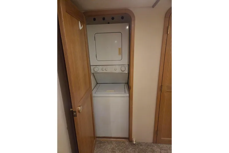 Slide: The Image of Stacked washer and dryer in 1997 West Bay Sonship yacht interior. - 34