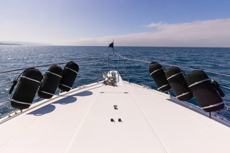 Slide: The Image of Bow view of 1997 West Bay Sonship yacht cruising on open sea. - 8