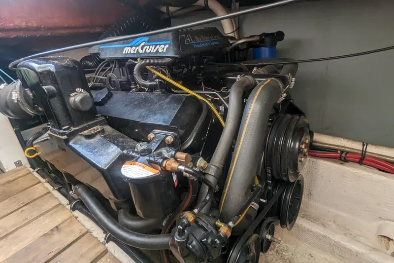 Slide: The Image of Engine compartment of a 1995 Wellcraft 330 Coastal with MerCruiser 7.4L engine. - 33