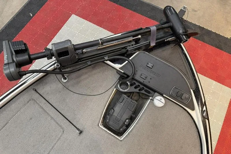 Slide: The Image of 2026 Nitro Z18 boat deck with trolling motor and control panel. - 8