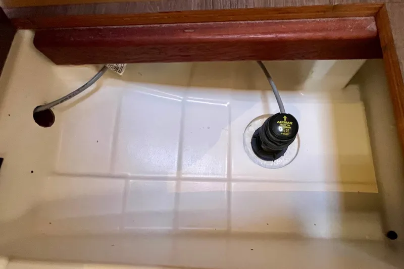 Slide: The Image of Bilge area of 2015 Beneteau First 235 sailboat with wiring and sensor. - 34