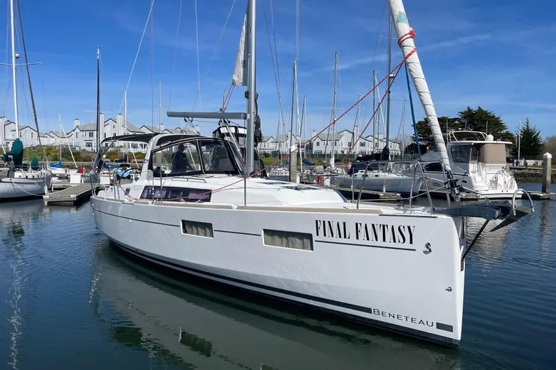 Slide: The Image of Beneteau First 235 sailboat named "Final Fantasy" docked in a marina, 2015 model. - 4