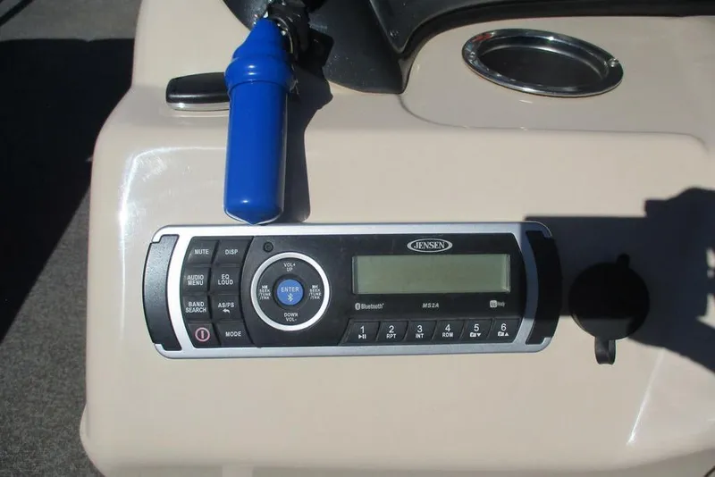 Slide: The Image of Control panel of 2026 Sun Tracker Fishin' Barge 24 DLX with Jensen audio system. - 4