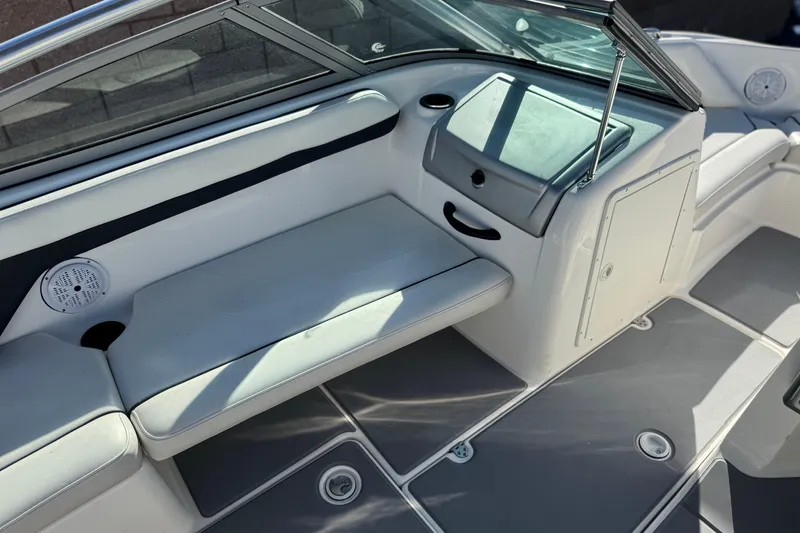 Slide: The Image of 2015 Yamaha Boats AR190 interior with seating and storage compartments. - 20