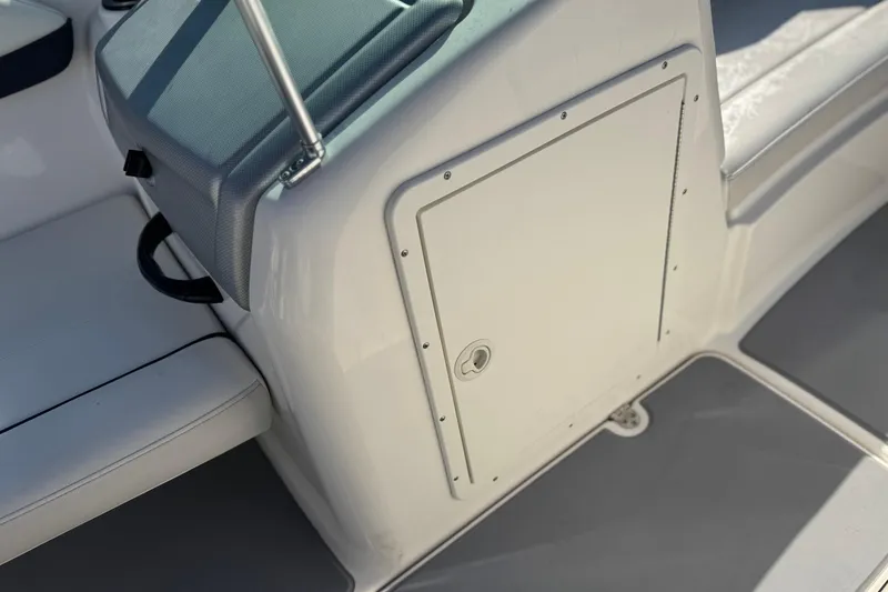 Slide: The Image of 2015 Yamaha Boats AR190 interior seating and storage compartment. - 22