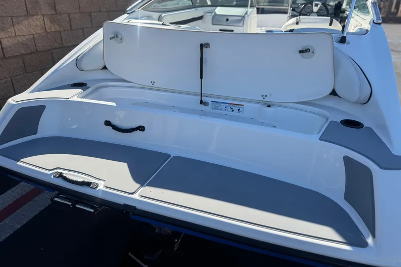 Slide: The Image of 2015 Yamaha Boats AR190 rear deck with open storage compartment. - 7