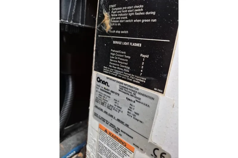 Slide: The Image of Label on Cummins Onan generator in 2004 Riviera 4000 Offshore boat. - 36