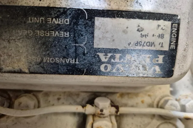 Slide: The Image of Close-up of a Volvo Penta engine label on a 2004 Riviera 4000 Offshore. - 47