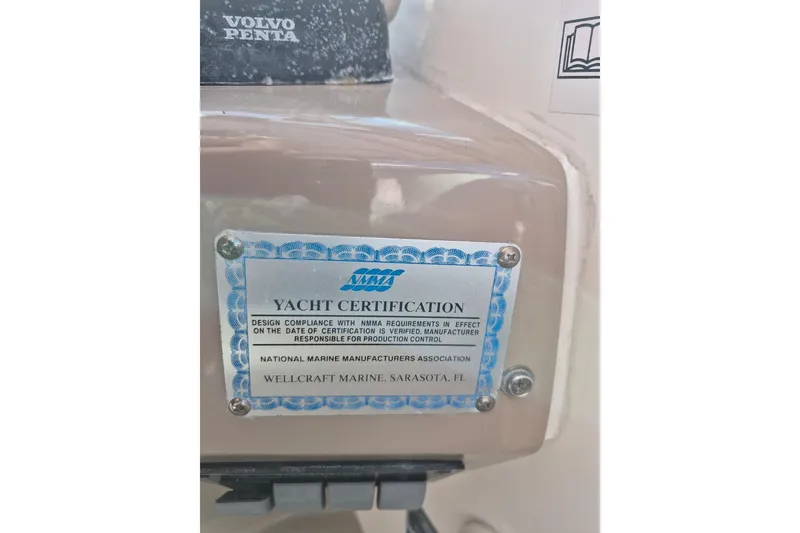 Slide: The Image of Yacht certification plaque on 2004 Riviera 4000 Offshore, featuring Volvo Penta engine. - 73