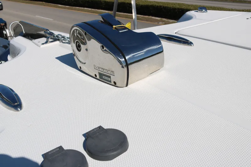 Slide: The Image of 2026 World Cat 325 CC boat deck with Lewmar winch and cleats. - 7