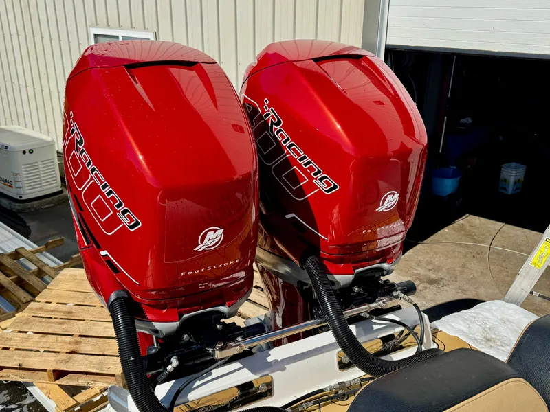 Slide: The Image of Red outboard engines on a 2019 Concept 36' Open Deck boat. - 1