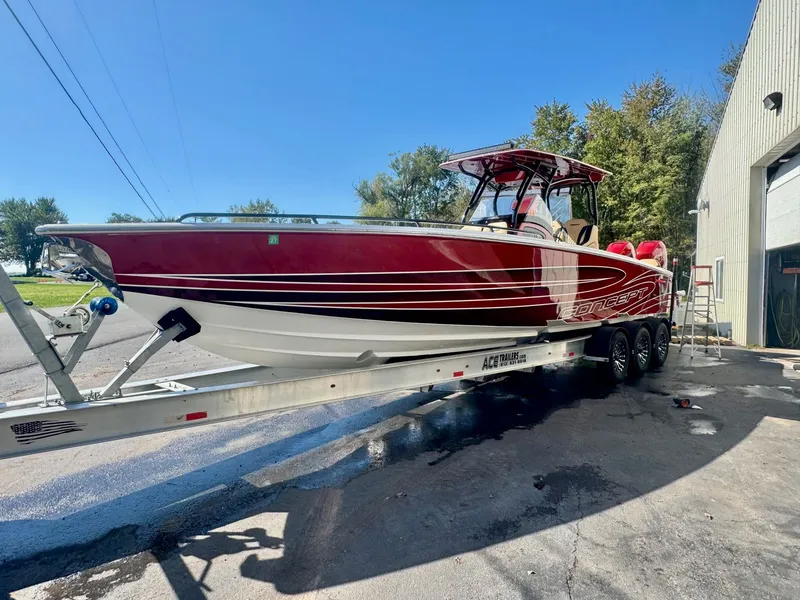 Slide: The Image of 2019 Concept 36' Open Deck boat on trailer, red color. - 16