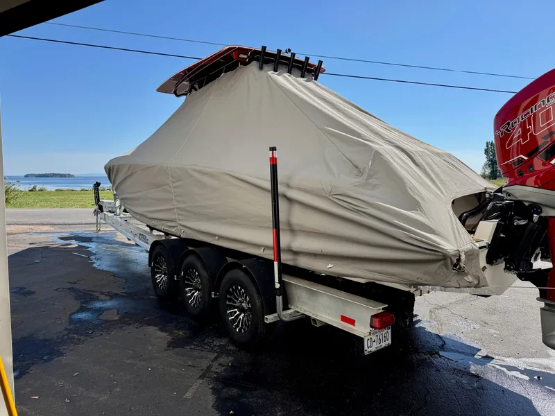 Slide: The Image of 2019 Concept 36' Open Deck boat on trailer, covered. - 18