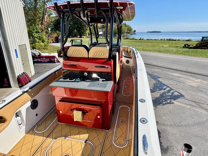 Slide: The Image of 2019 Concept 36' Open Deck boat parked by the shore. - 2